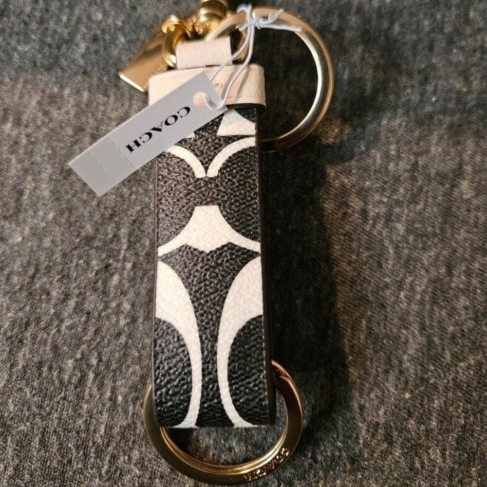 Coach charm